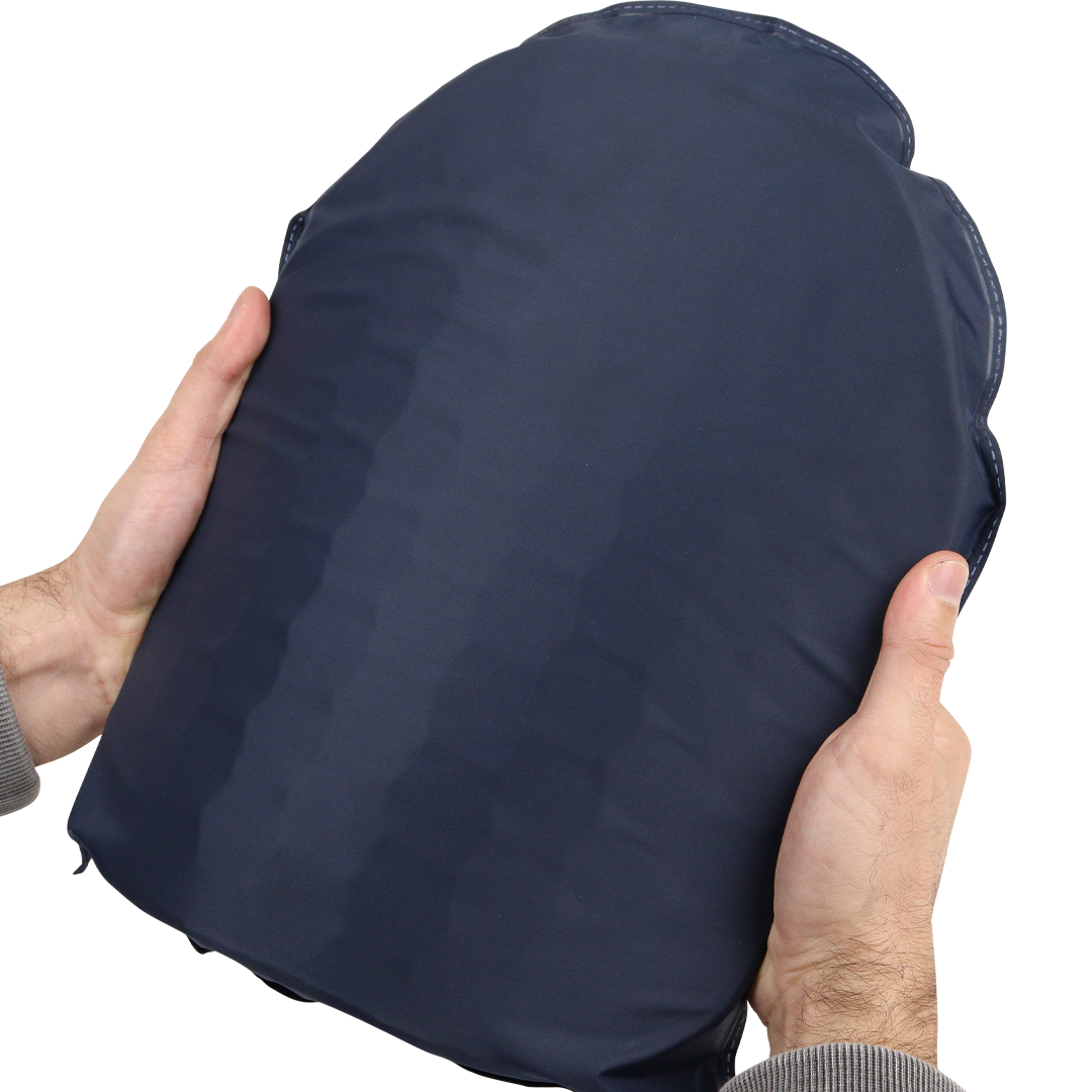 Hands holding PGL Armor NIJ level 3 ballistic plate showing its curved ergonomic shape